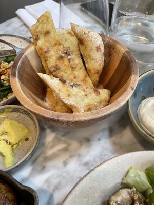 sourdough flatbread with cultured house butter  at Plants by Deliciously Ella in London