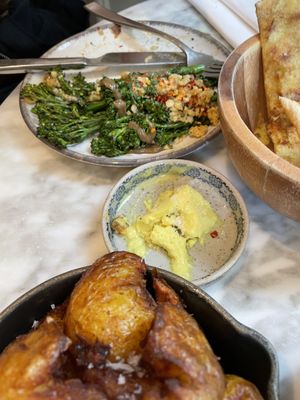 Homemade butter and charred broccoli truffle vinaigrette, macadamia parmesan, chili  at Plants by Deliciously Ella in London
