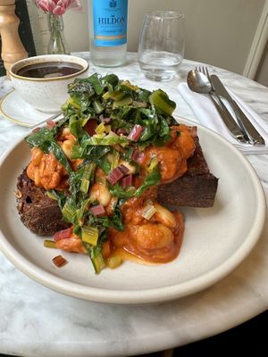 harissa and garlic butterbeans with garlic & chili sautéed rainbow chard on pan-fried garlicky sourdough  at Plants by Deliciously Ella in London