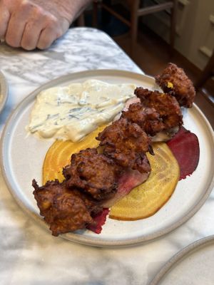 Sweet corn fritters with pickled beetroot   at Plants by Deliciously Ella in London