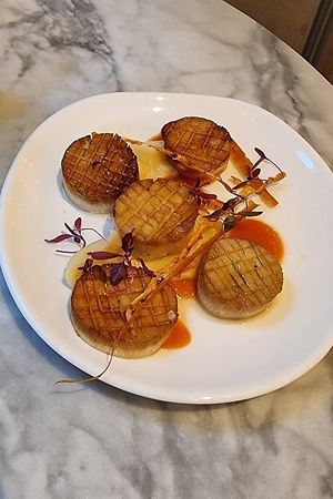 Scallops made of oyster mushrooms at Plants by Deliciously Ella in London