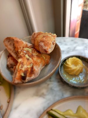 Bread with cashew butter at Plants by Deliciously Ella in London