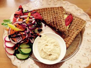 Delicious vegan cheese & red pepper toastie with colourful mixed salad and houmous at Boo-Tea-Licious Tea Rooms in Paphos