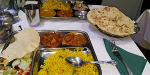Medium thali with garlic naan at HealthyWealthy in North London