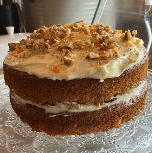 This is a Carrot Cake - Beth's homemade, with extra helpings of love Carrot Cake at Santosa Wellness Centre Cafe in Edinburgh