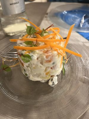 Russian Potato Salad appetizer (cold potato salad with peas and capers in tasteless mayo)   at La Tecia Vegana in Venice