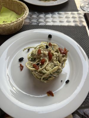 Raw zucchini spaghetti with cashews and avocado sauce-for the price horrible, taste is normal   at La Tecia Vegana in Venice