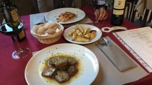 Roasted seitan, lasagna, roasted potatoes at La Tecia Vegana in Venice