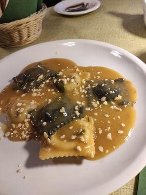 Black and white ravioli with funghi and seitan filling and cashew sauce at La Tecia Vegana in Venice