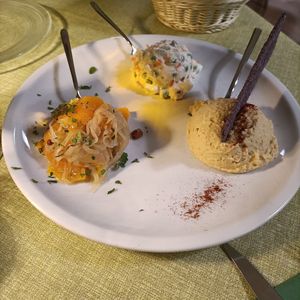 Tris di antipasti (zucca in saor, hummus, insalata russa) at La Tecia Vegana in Venice