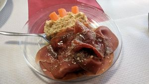 for starters, hummus and homemade sliced seitan (mopur) at La Tecia Vegana in Venice