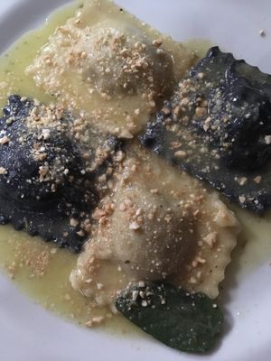 Black and white ravioli filled with seitan ragout at La Tecia Vegana in Venice