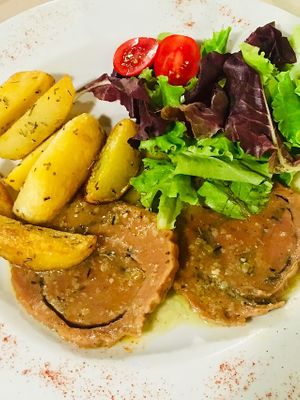 Seitan roast with potatoes  at La Tecia Vegana in Venice