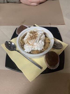    Apple crumble with whipped cream and two hazelnut truffles  at La Tecia Vegana in Venice