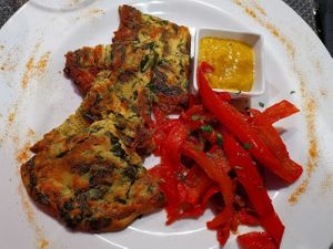 Chickpea spinach and onions omelette with peperonata at La Tecia Vegana in Venice