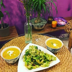 Homemade sancocho and broccoli stir fry  at SUKA in San Juan