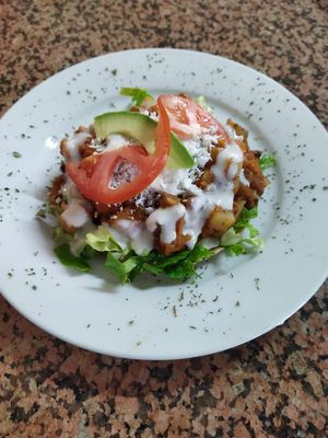 Tostada de picadillo de frijol mongo   at Paraíso Vegano in Mexico City
