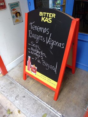Outside sign: vegan burgers galore! at Kuky's Place in Zaragoza