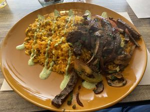 Tacu tacu con lomo saltado a base de quinoa  at Mestizo Vegano in Bogota