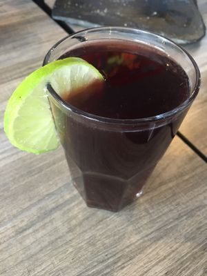 Chicha morada con limón y naranja tangelo at Mestizo Vegano in Bogota
