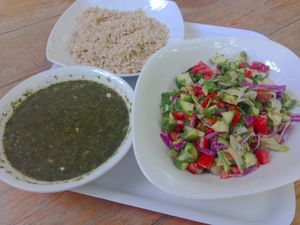 Molokhia and rice with baladi salad at Osana Wholefood Restaurant in Cairo