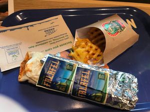 Vegan falafel wrap (chilli sauce in place of aioli) with fries at AMS - LEON in Schiphol