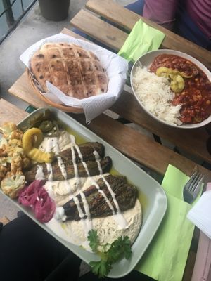 Baked Eggplant layed on a hummus bed, chili sin carne and i assume Home made bread cause it tasted so fresh !   at Chakula in Landshut