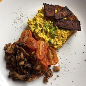 Mushroom medley, scrambled tofu, oven baked balsamic tomatoes and vegan ‘bacon’ at Vegan Villa in Siem Reap