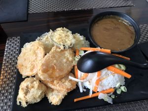 Vegetable tempura with rice and katsu curry sauce  at Nippon Kitchen in Glasgow