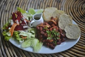 Homemade pan bread with homemade tomato beans and a fresh salad. No Heinz beans here - only real whole foods! at Peace Food Cafe in Sihanoukville