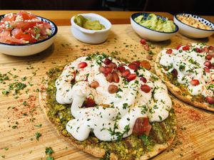 Open Pitta breads with falafel & guacamole sauce  at Chickpea in Antwerpen