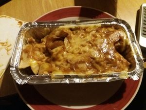 Curry cheese chips at McGuinness - Takeaway in Dublin
