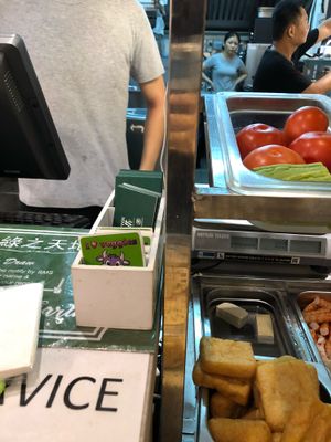 Happycow stickers at Green on Earth 绿之天地 in West Singapore