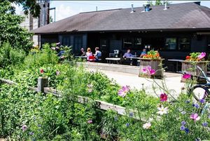 Outside seating at Public Greens - 64th St in Indianapolis