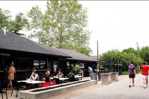 Outdoor seating at Public Greens - 64th St in Indianapolis