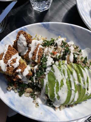 Warm grain bowl with falafel and vegan ranch  at Public Greens - 64th St in Indianapolis