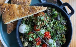 Customers favourite - green shakshuka at MOTHER - Juice Works in East London