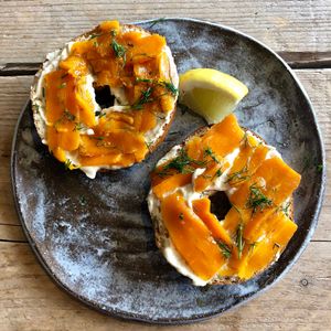 Smoked carrot lox gluten free bagel with nut cheese at MOTHER - Juice Works in East London