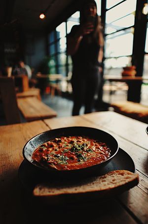 Curried chickpea stew & sourdough bread, epic food and wicked vibes 💚✌️ at MOTHER - Juice Works in East London