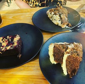 Lots of delicious cake, the carrot cake was my favourite  at MOTHER - Juice Works in East London