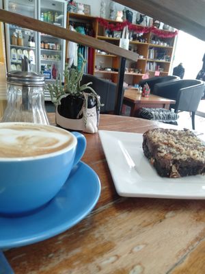 Sweet potato brownie and flat white W/ soy at Cat Cuddle Cafe in Lutwyche