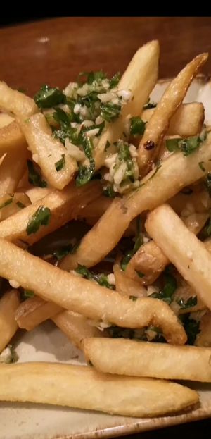 garlic fries (order without cheese!) at Alvarado Street Brewery and Grill in Monterey