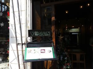 Menu outside for passing potential customers. Vegan at Minh Chay - Hang Gai in Hanoi