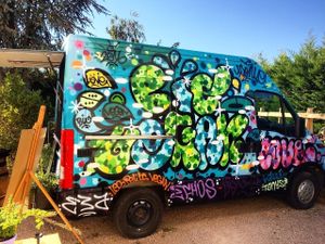 Graphiti face 2 at Vegan Truck in Marcy-letoile