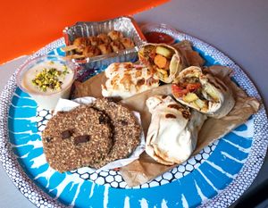 Delivery: Wraps + Meatballs + Cookies + Pudding (crème) at SAMAM - Cantine végétale in Paris