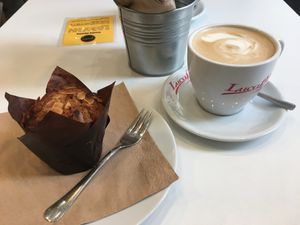 Coconut muffin with raspberry jam filling and soya latte at Picnic in Glasgow