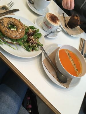 Cream cheese bagel, tomato & red pepper soup and a cappuccino with oat milk  at Picnic in Glasgow