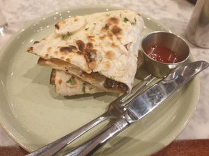 Vegan sausage naan roll at Dishoom in Edinburgh