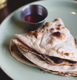 Vegan sausage naan roll at Dishoom in Edinburgh