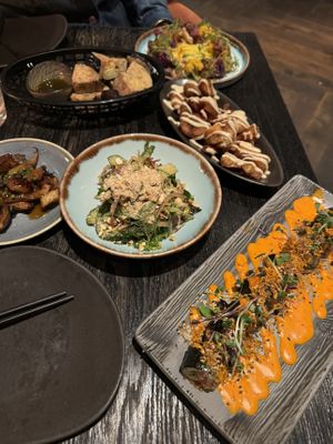 Aubergine fries, tomato ceviche, bbq mushrooms. Vegan maki roll, crispy potatoes, grilled cucumber saladd  at Asia in Oslo